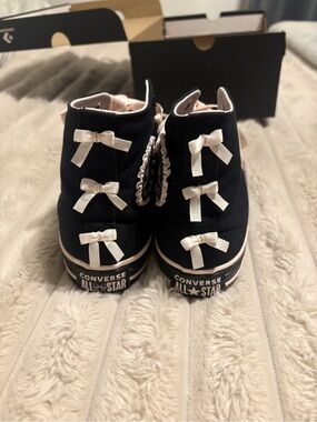 Converse Black High-Top Sneakers with Pink Ribbon Bows